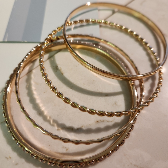 Gold tone set of bangle bracelets - Picture 4 of 5